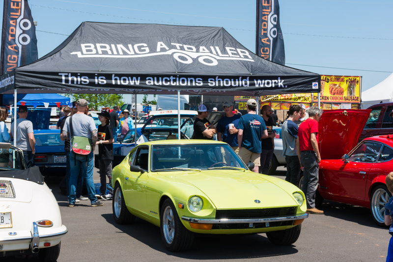 Bring A Trailer, oddly, didn’t bring a trailer as far as I could tell. They did bring this perfect 240Z. And a tent. And doughnuts.
